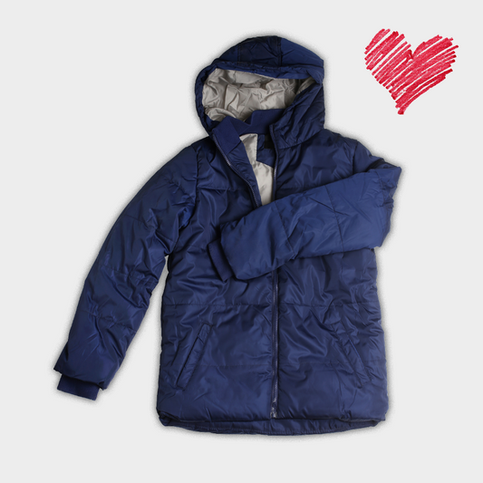 Giv en vinterjakke til et barn på flugt